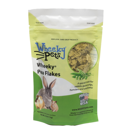 Wheeky Pea Flakes, a special treat for rabbits, guinea pigs and small pets. Front of package.