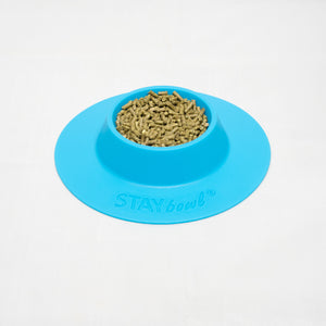 Small (1/4-cup) Sky Blue STAYbowlⓇ Tip-Proof Bowl for Guinea Pigs and Small Pets Filled with Kibble - Wheeky Pets, LLC (Green Oak Technology Group)