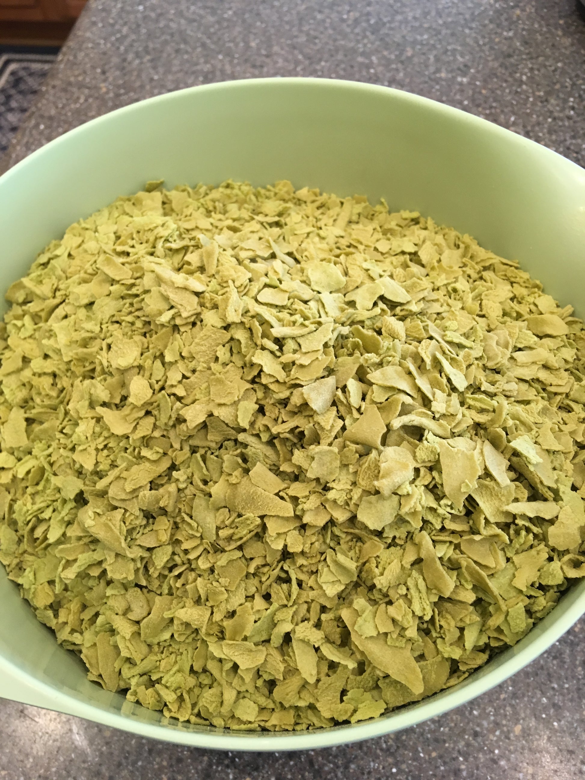 A large bowl of WheekyⓇ Pea Flakes.